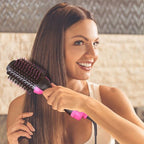 Woman smoothing long straight hair with the GlideCool Bloumé Lift